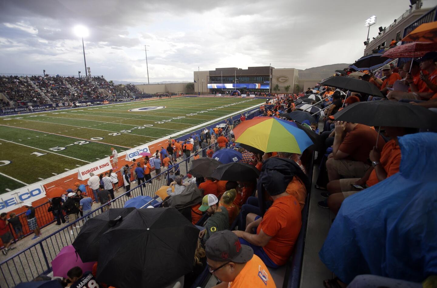 The start of the high school football game between No. 2-ranked Bishop Gorman and top-ranked St. John Bosco was delayed nearly an hour Friday night because of lightning.