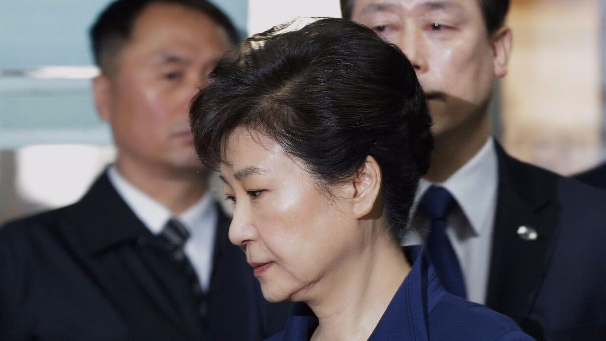 Ousted South Korea President Park Geun-Hye arriving for questioning on her arrest warrant at the Seoul Central District Court in Seoul in March.