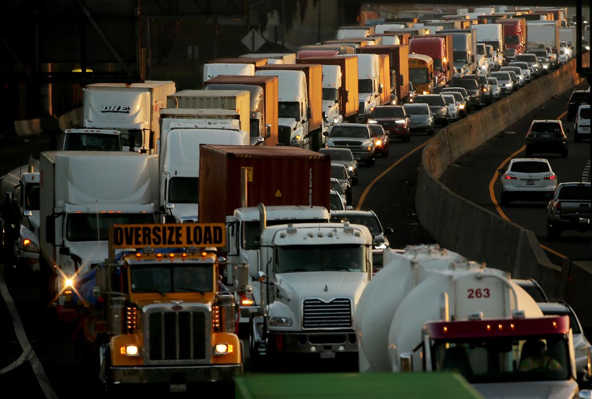 Truck traffic jams the Long Beach Freeway as cargo moves out of the ports of Long Beach and Los Angeles.
