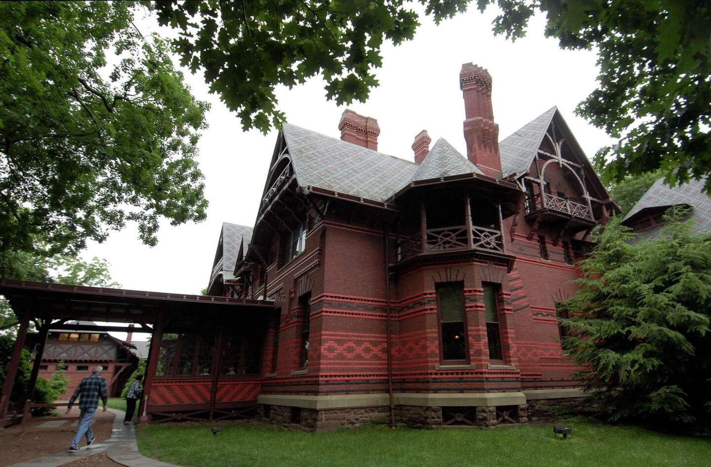 Visitors enter the Mark Twain House in Hartford, Conn., on June 4, 2008. It was built in 1874.