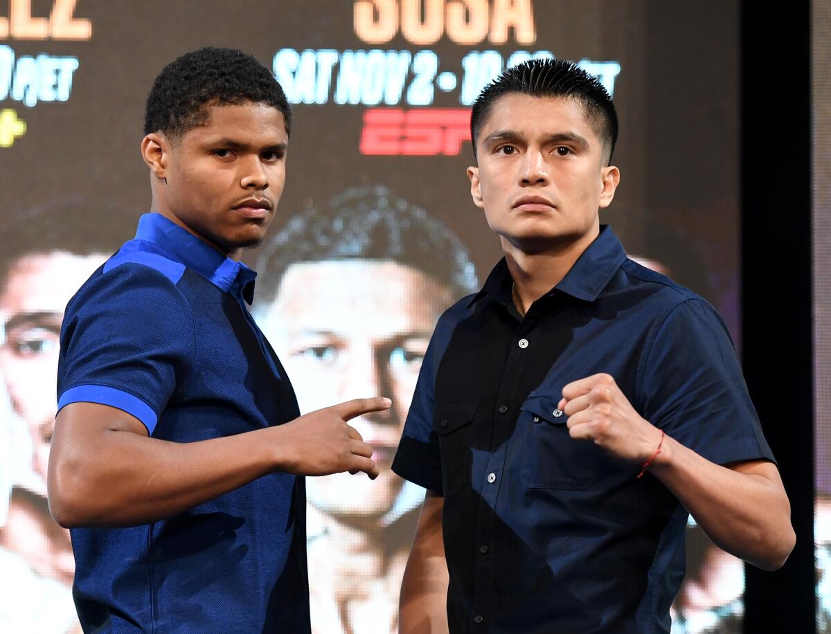 Shakur Stevenson, left, and Joet Gonzalez pose for a photo during a news conference on Sept. 13, 2019, in Las Vegas.