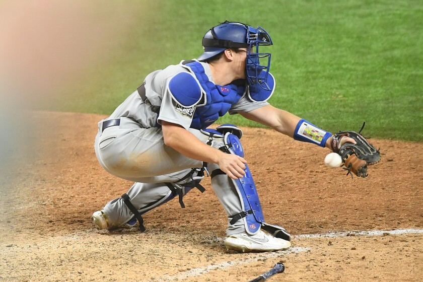 ARLINGTON, TEXAS OCTOBER 24, 2020-Dodgers catcher Will Smith drops the ball.