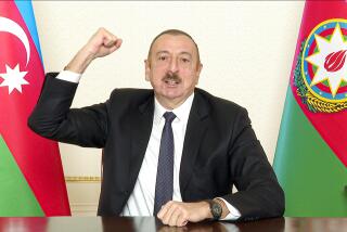 In this photo provided on Wednesday, Nov. 25, 2020, by the Azerbaijan's Presidential Press Office, Azerbaijani President Ilham Aliyev gestures as he addresses the nation in Baku, Azerbaijan. The Azerbaijani army has entered the Kalbajar region, one more territory ceded by Armenian forces in a truce that ended deadly fighting over the separatist territory of Nagorno-Karabakh. (Azerbaijani Presidential Press Office via AP)