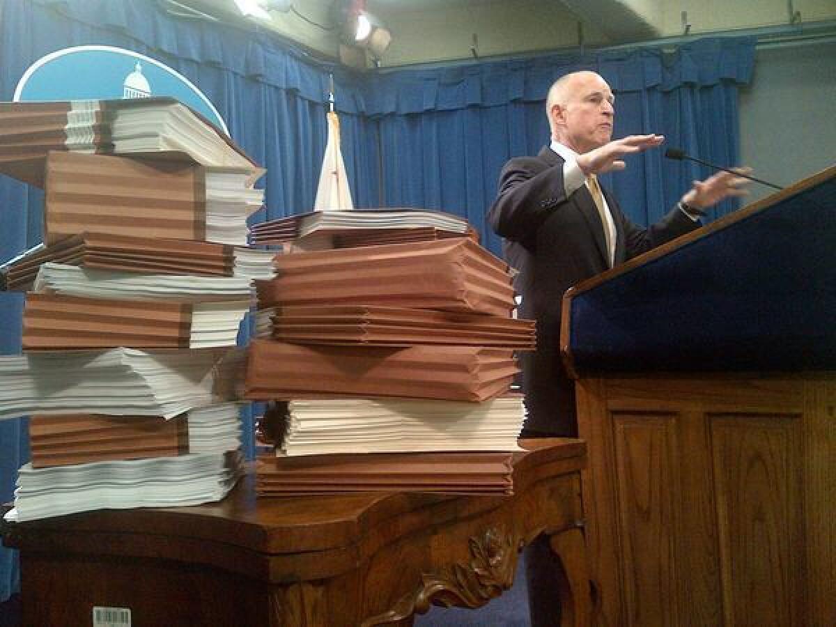 Gov. Jerry Brown, shown here in January pledging to appeal prison crowding caps before the U.S. Supreme Court, says he is optimistic about negotiations between the state and lawyers for inmates.