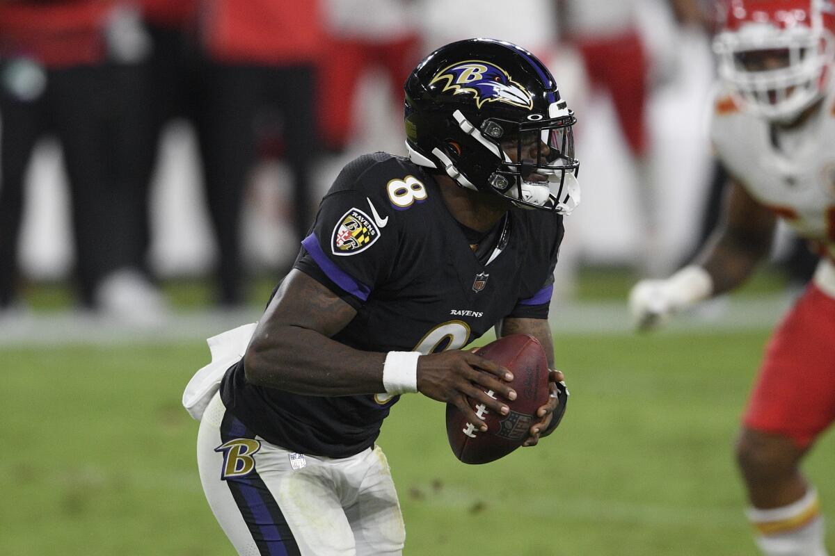 Baltimore Ravens quarterback Lamar Jackson runs with the ball against the Kansas City Chiefs on Sept. 28.