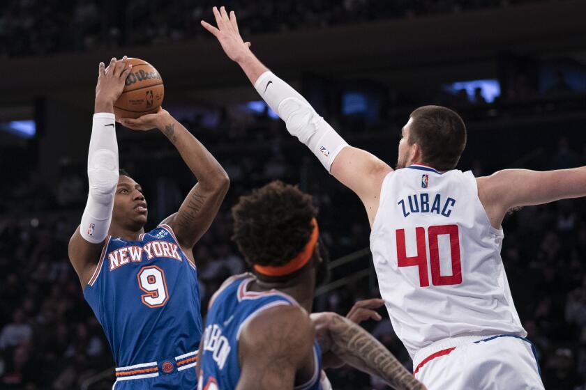 New York Knicks guard RJ Barrett (9) shoots against Los Angeles Clippers center Ivica Zubac.