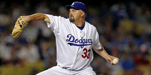 David Wells pitches against the San Diego Padres during the first inning at Dodger Stadium.