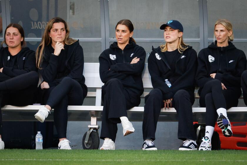 San Diego, CA - April 27: San Diego Wave FC's Alex Morgan (13), center, sits on the bench during their game against Bay City FC at Snapdragon Stadium on Saturday, April 27, 2024 in San Diego, CA. (Meg McLaughlin / The San Diego Union-Tribune)