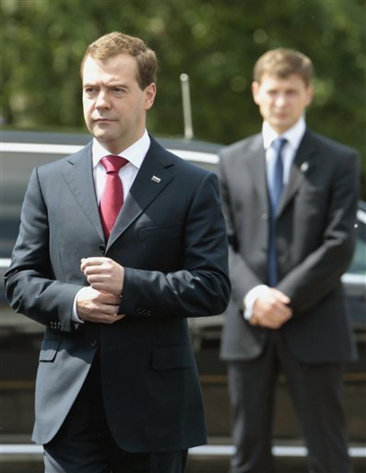 Russia's President Dmitry Medvedev arrives for a state reception to mark the Day of Russia in the Moscow Kremlin, on Saturday, June 12, 2010. Kyrgyzstan on Saturday asked Russia to send troops to end ethnic violence in the impoverished nation that hosts U.S. and Russian military bases. There was no immediate response from Moscow to Otunbayeva's plea for help. (AP Photo/Alexander Natruskin, Pool)