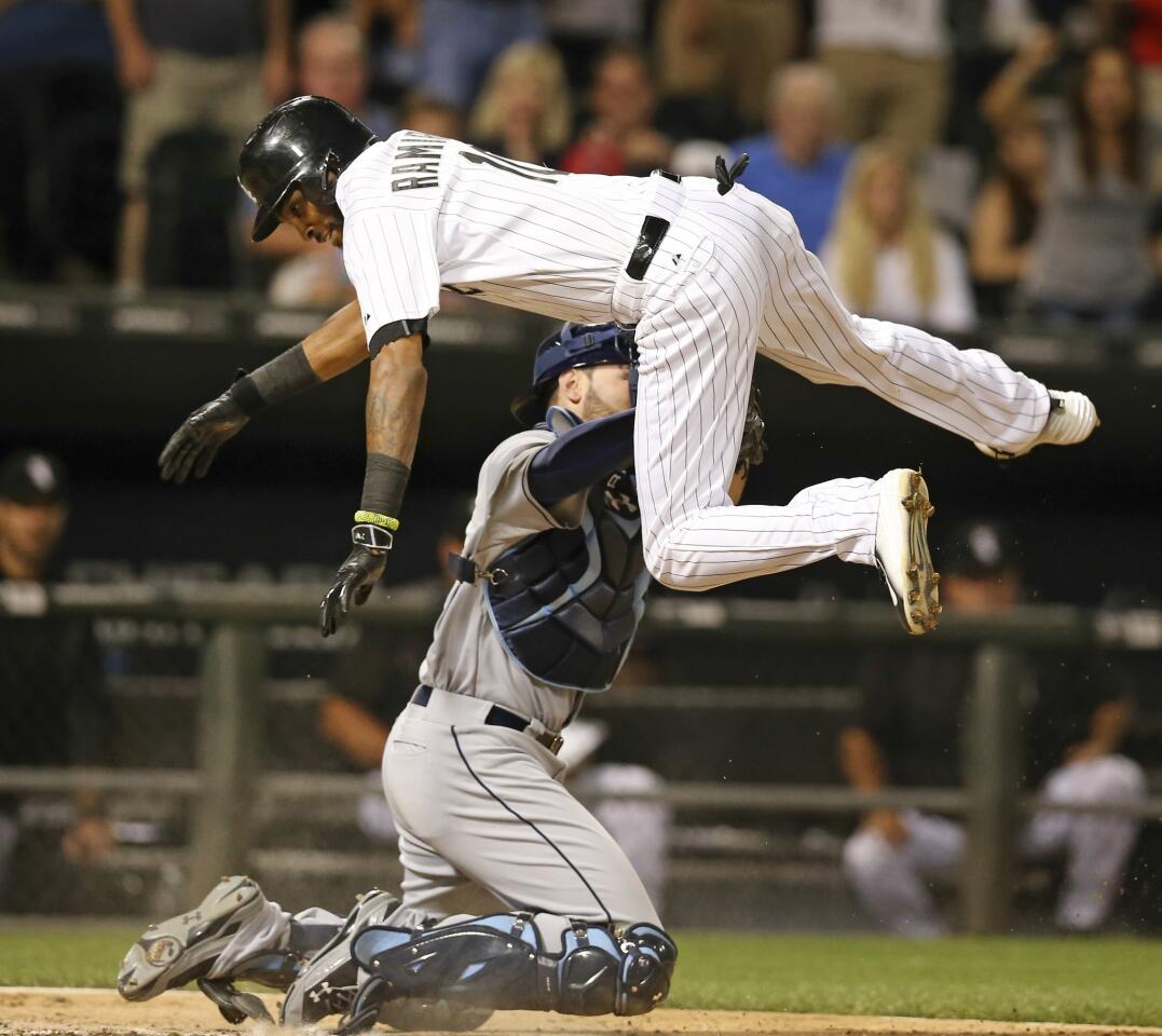 Alexei Ramirez is tagged out at home plate by Rays catcher Curt Casali during the ninth inning.