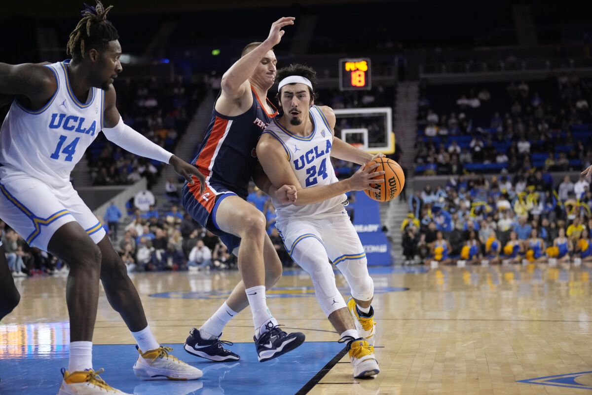 UCLA guard Jaime Jaquez Jr. drives to the basket against Pepperdine.