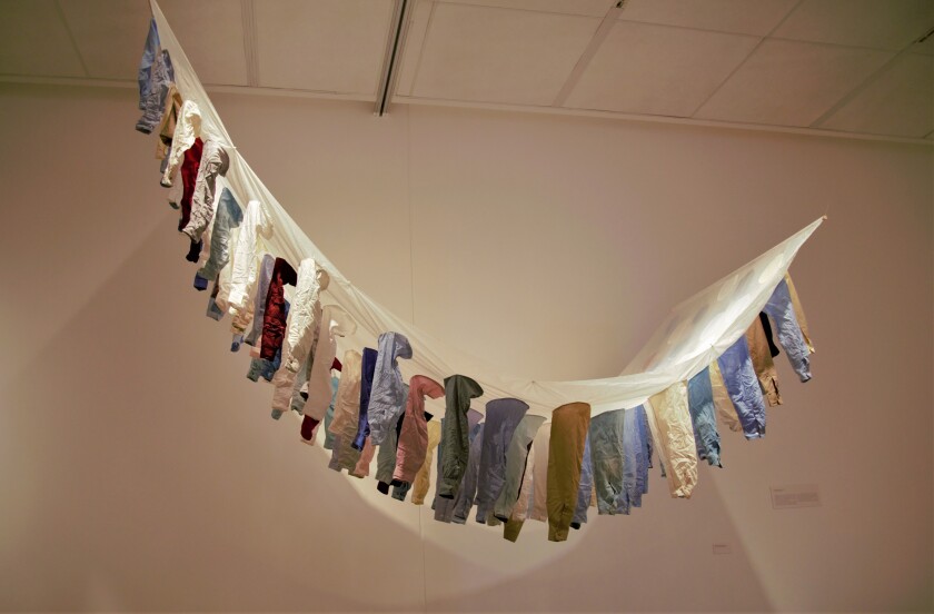 “Realidades desgastadas,” 2005, a textile work made from shirt sleeves by Irma Sofia Poeter at CECUT
