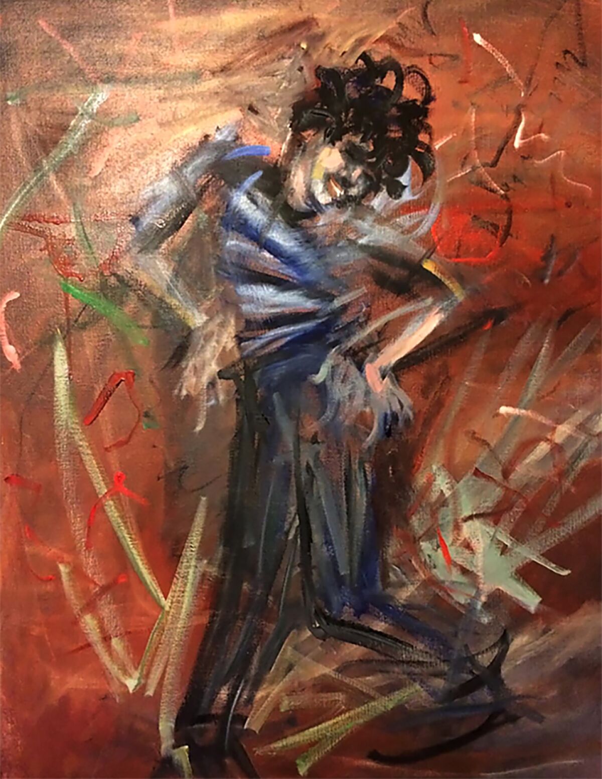 A portrait of Mando Montaño dancing.