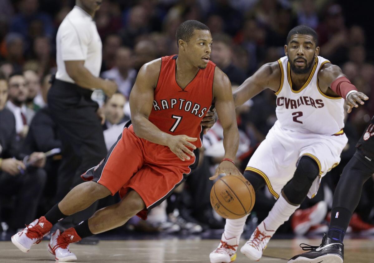 Toronto guard Kyle Lowry drives past Cavaliers guard Kyrie Irving in a game in Cleveland last week. The Raptors won 110-93.