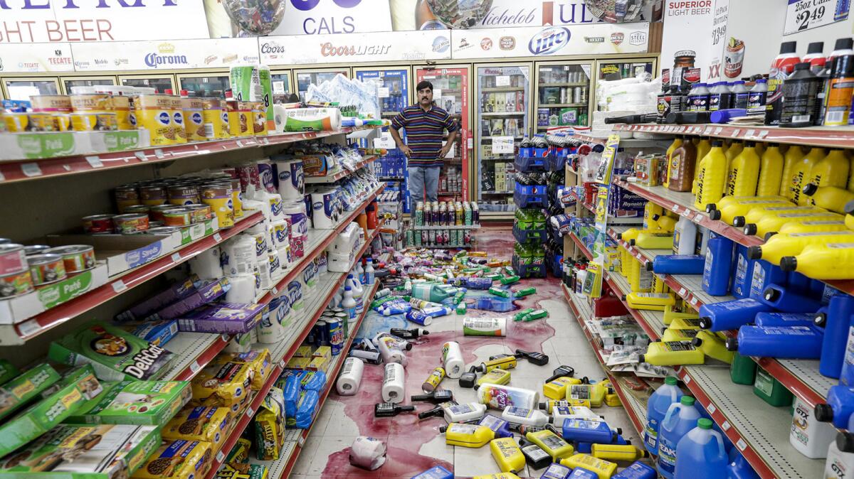 Javaid Waseem surveys the damage done by the July 5, 2019, earthquake at his Ridgecrest gas station. 