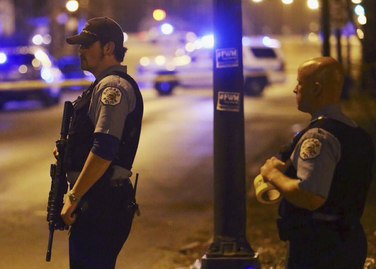 On Sunday, Chicago police stood guard at one shooting scene where five children, all 15 years old or younger, were shot and wounded in Chicago.