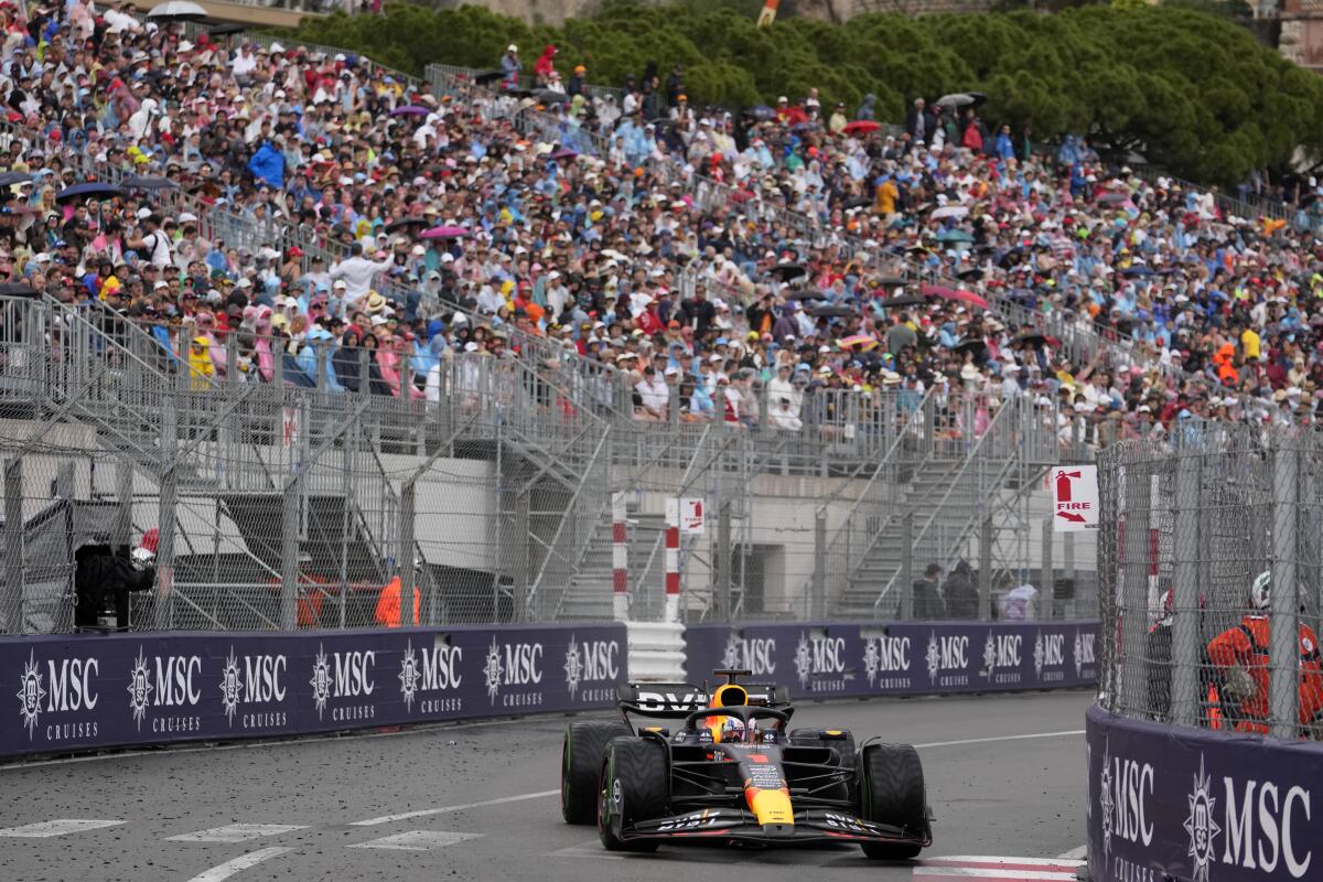 Max Verstappen steers at the Monaco racetrack.