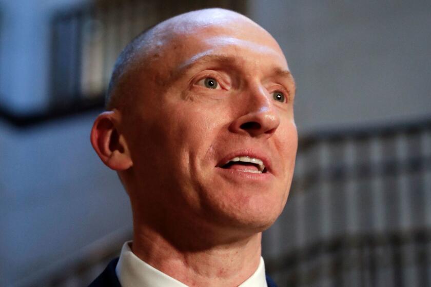 Carter Page, a foreign policy adviser to Donald Trump's 2016 presidential campaign, speaks with reporters following a day of questions from the House Intelligence Committee, on Capitol Hill in Washington, Thursday, Nov. 2, 2017. (AP Photo/J. Scott Applewhite)
