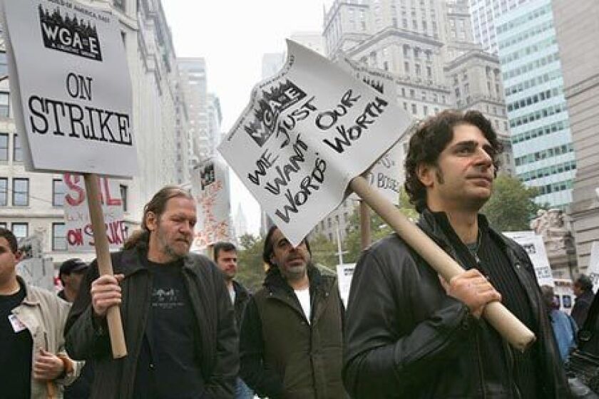 The Writers Guild of America, East set up picket lines at the edge of Battery Park, a subway stop away from Wall Street but as close as municipal officials would let them get to the New York Stock Exchange and the iconic bronze sculpture of a bull. Supporters of the WGA strike included Michael Imperioli, right, who played Christopher on "The Sopranos."