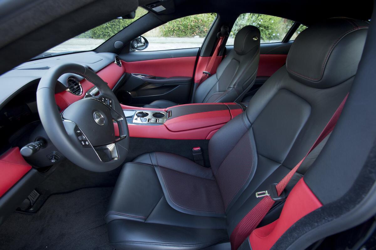 The Revero designers have outfitted their luxury car with rich, supple leather for a comfortable GT driving experience. (Myung J. Chun / Los Angeles Times)