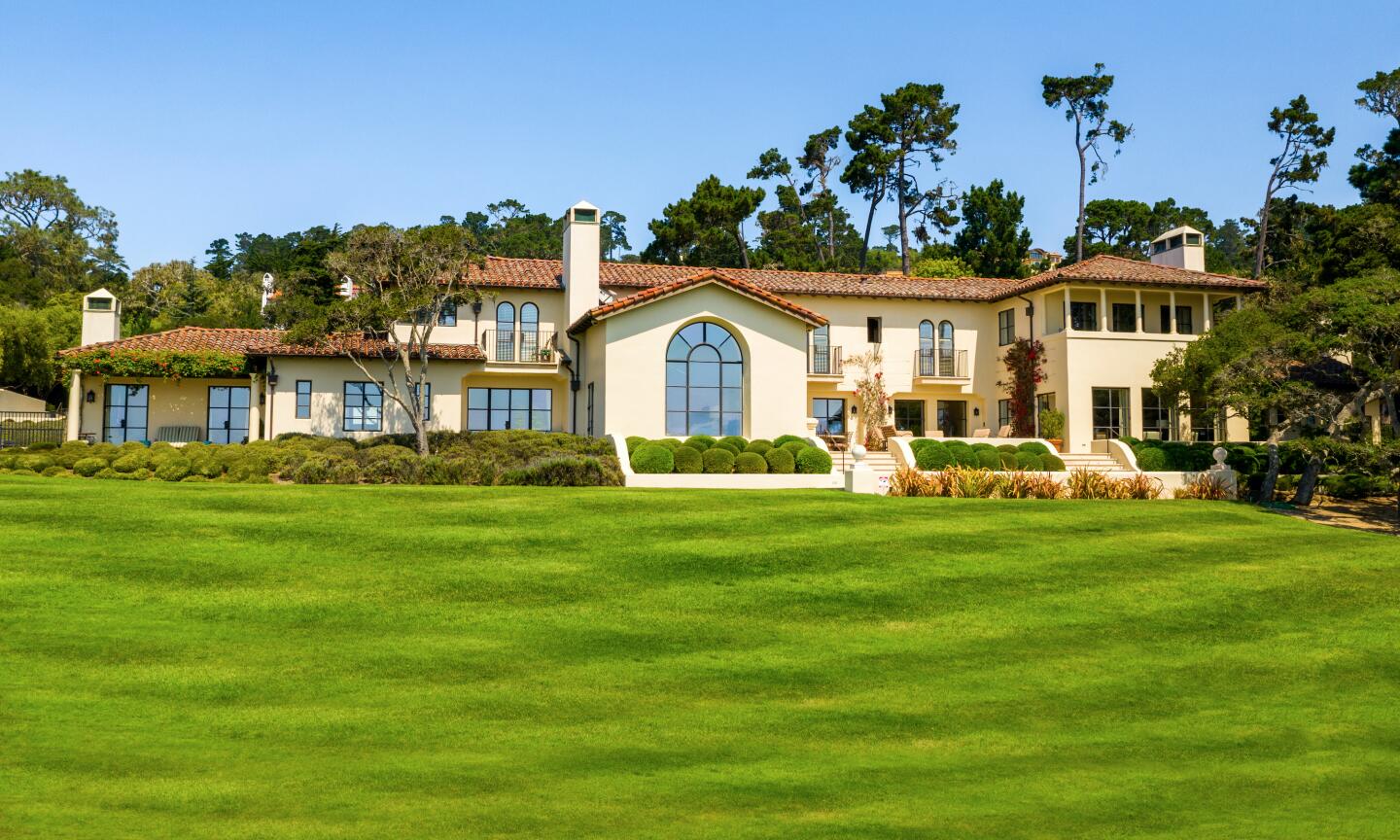 The 10,000-square-foot Mediterranean mansion includes a putting green, chipping area and golf simulation room.