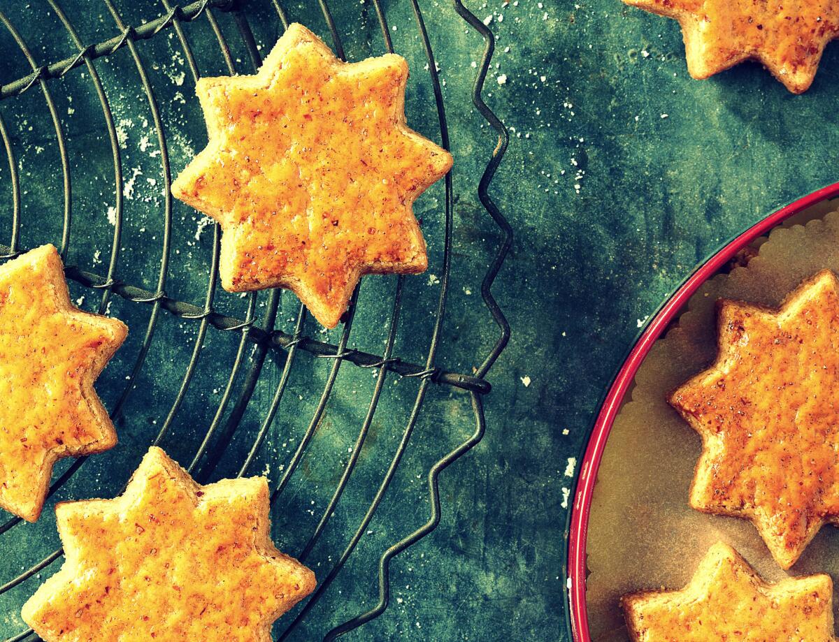 Sables de Noel, or Christmas sables, are traditional holiday cookies often shaped like trees, stars or snowmen, made with butter, vanilla, ground cinnamon and almonds.