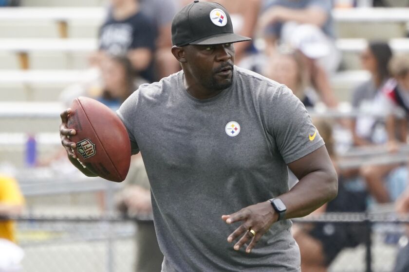 FILE - Pittsburgh Steelers senior defensive assistant Brian Flores works with the defense as they go through drills during practice at NFL football training camp in Latrobe, Pa., Monday, Aug. 8, 2022. Flores, who joined coach Mike Tomlin's staff in Pittsburgh following his messy departure with Miami, is interviewing with the Cleveland Browns on Thursday, Jan. 12, 2023, to be their new defensive coordinator. (AP Photo/Keith Srakocic, File)