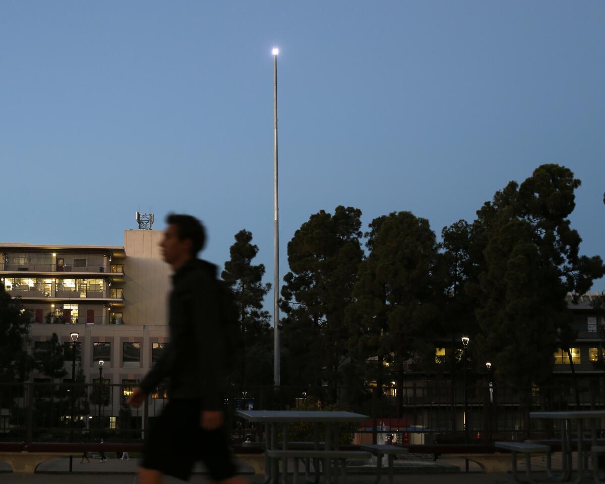 Los Angeles artist Mark Bradford's "What Hath God Wrought" is a 195-foot steel pole topped with a blinking light that transmits in Morse code the first message sent by telegraph.