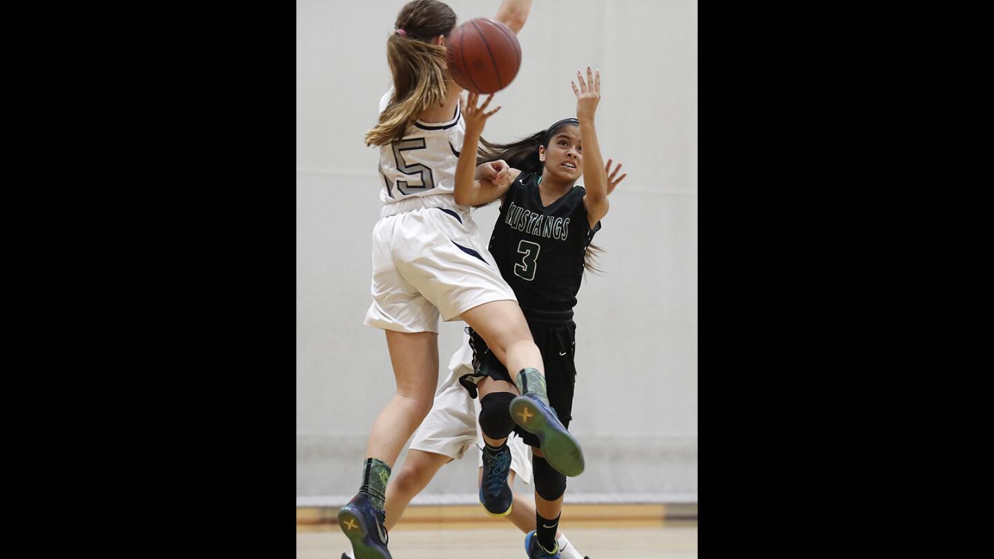 Photo Gallery: Newport Harbor vs. Costa Mesa in a girls' basketball game