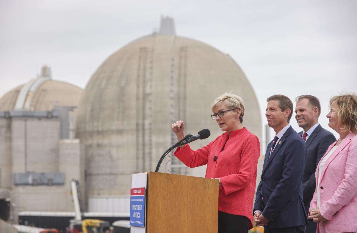 Energy Secretary Jennifer Granholm with San Onofre Nuclear Generating Station in the background