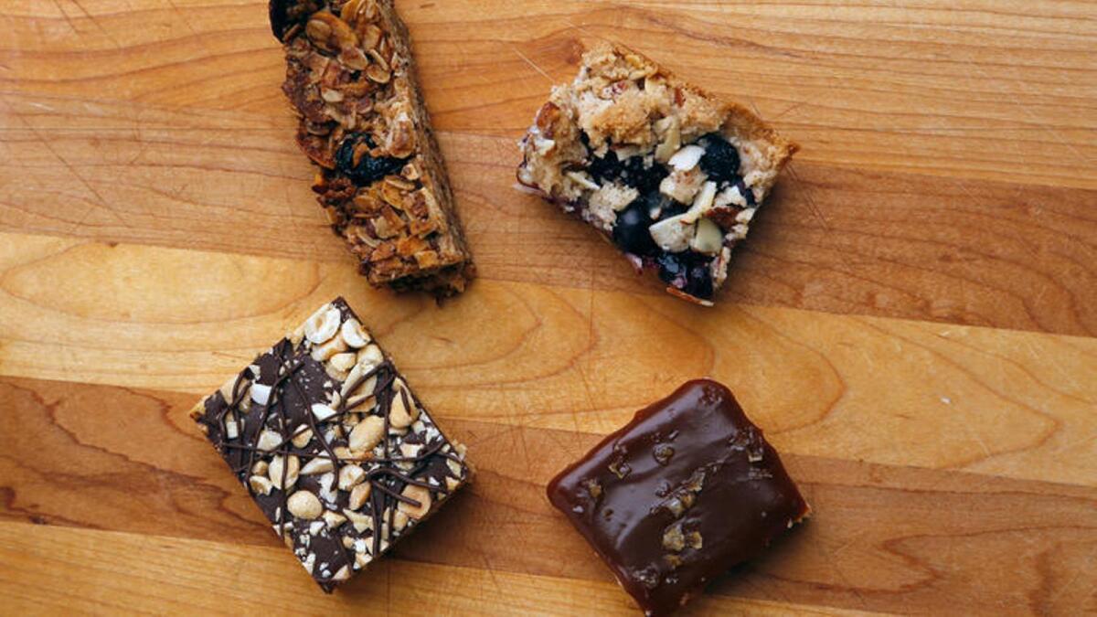 Clockwise from top left: Granola bars, vegan berry bars, salted caramel shortbread bars and no-bake peanut butter bars.