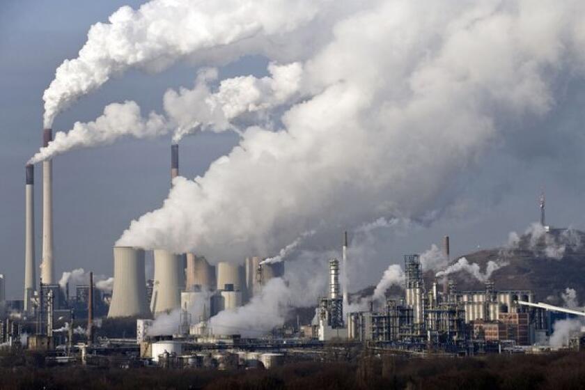 Steam and smoke rise from a coal power station in Gelsenkirchen, Germany.