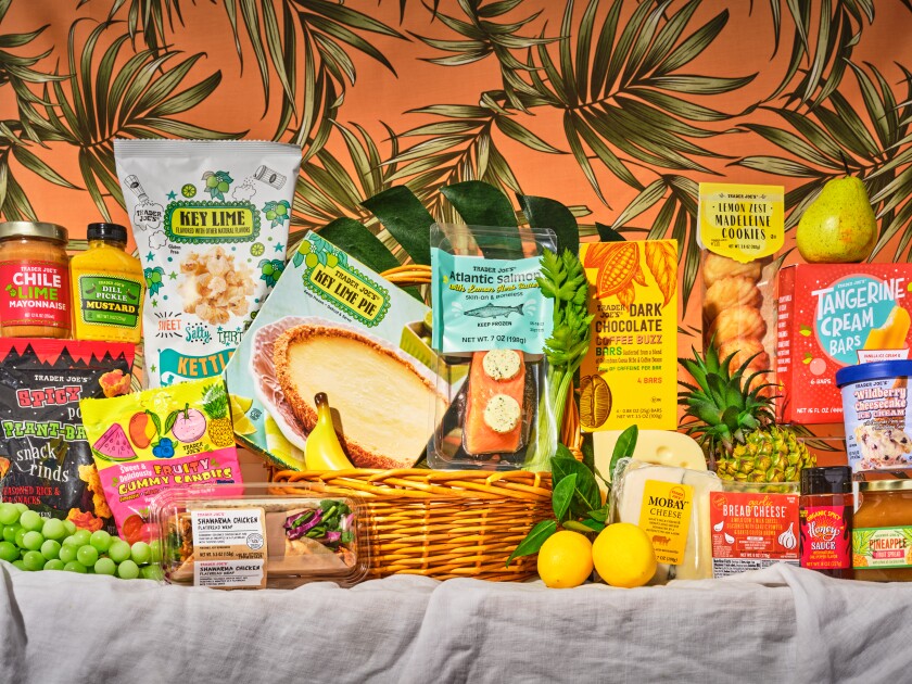 Food items from Trader Joe's set against a tropical background