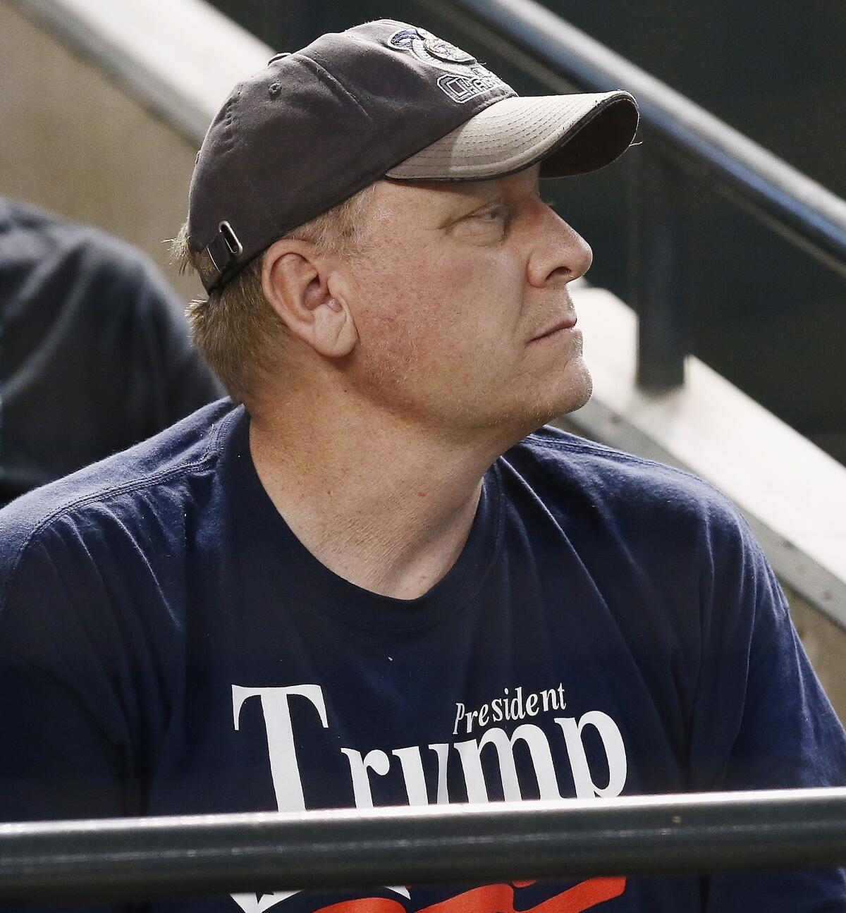 Former pitcher Curt Schilling watches a game between the Arizona Diamondbacks and the San Francisco Giants in 2018