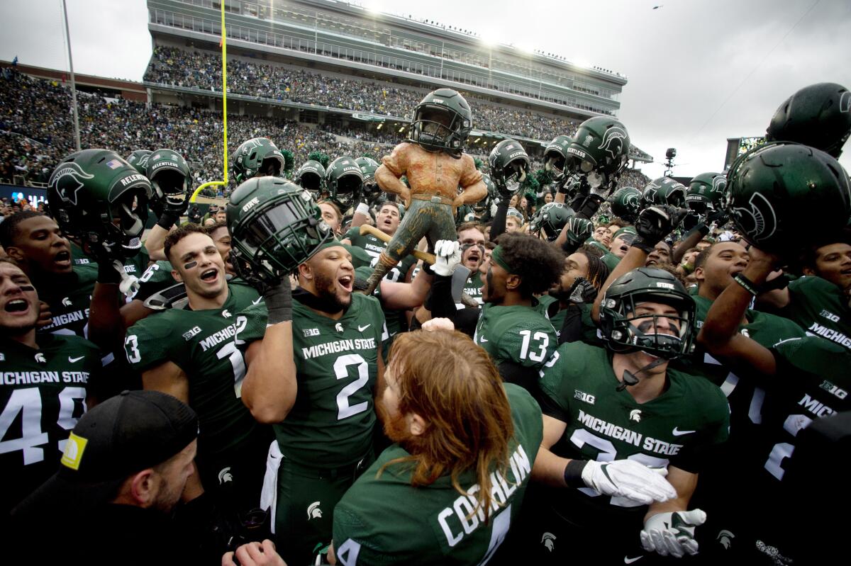 Army players celebrate the team's 6-0 win in the 22nd Annual Army