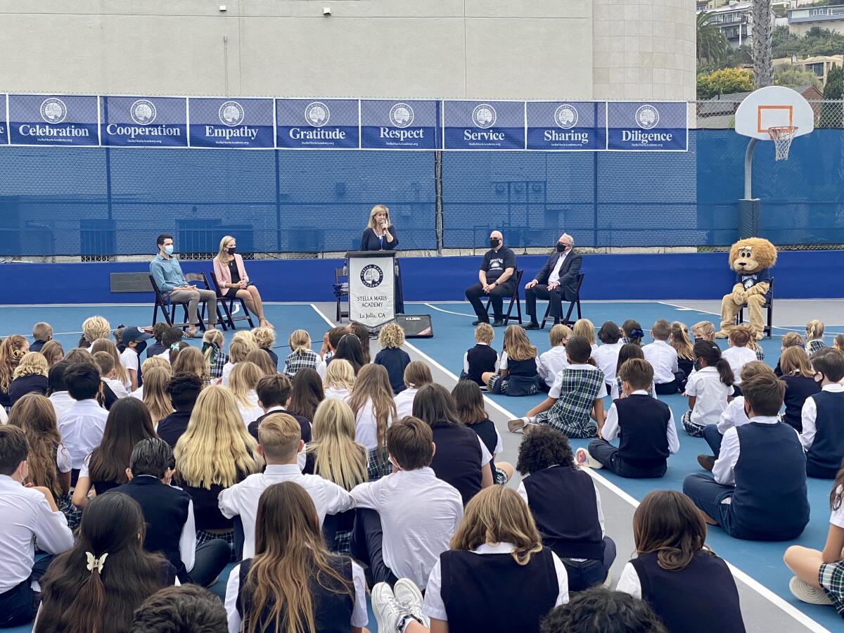 Stella Maris Principal Francie Moss challenges students to perform 75 acts of kindness for the school's 75th anniversary.