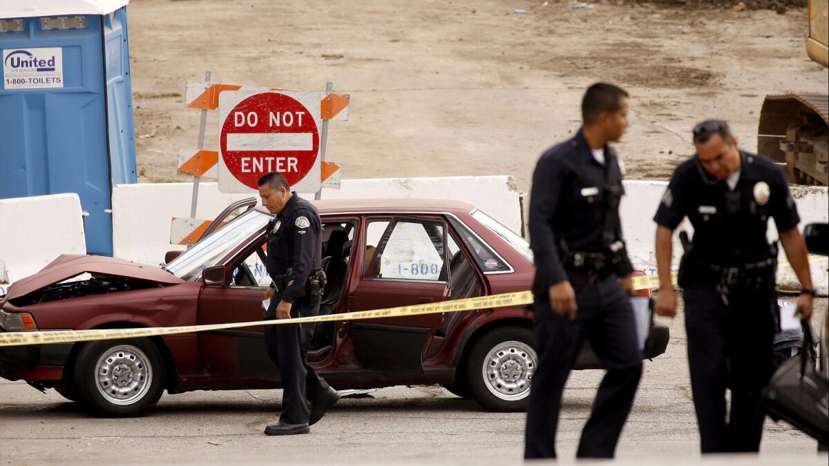 A crashed vehicle at Medford and Soto streets in Lincoln Heights as the LAPD investigates the shooting of two people Monday April 17, 2017.