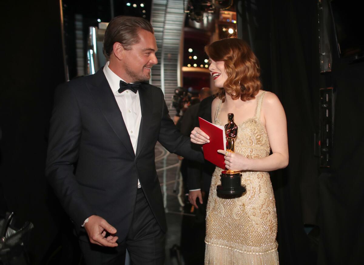 Leonardo DiCaprio and Emma Stone backstage at the 2017 Oscars.