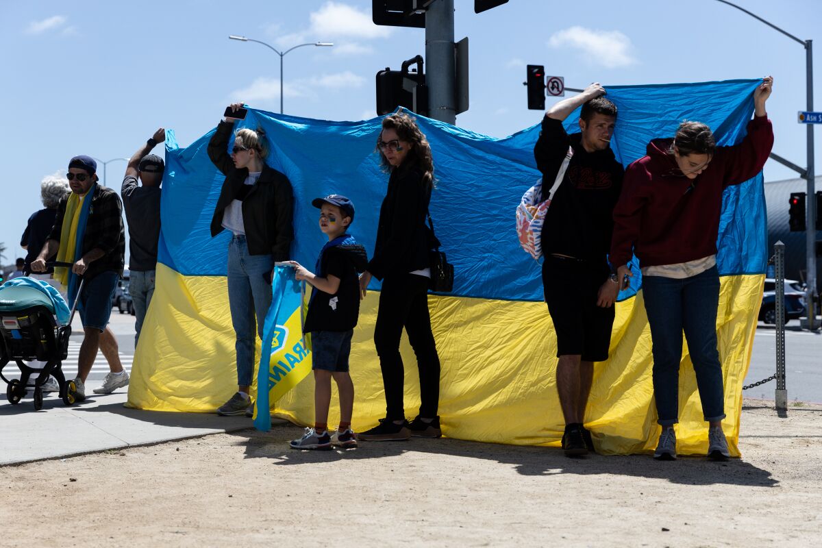 San Diegans rally in support of Ukraine at Waterfront Park in downtown San Diego on Saturday.
