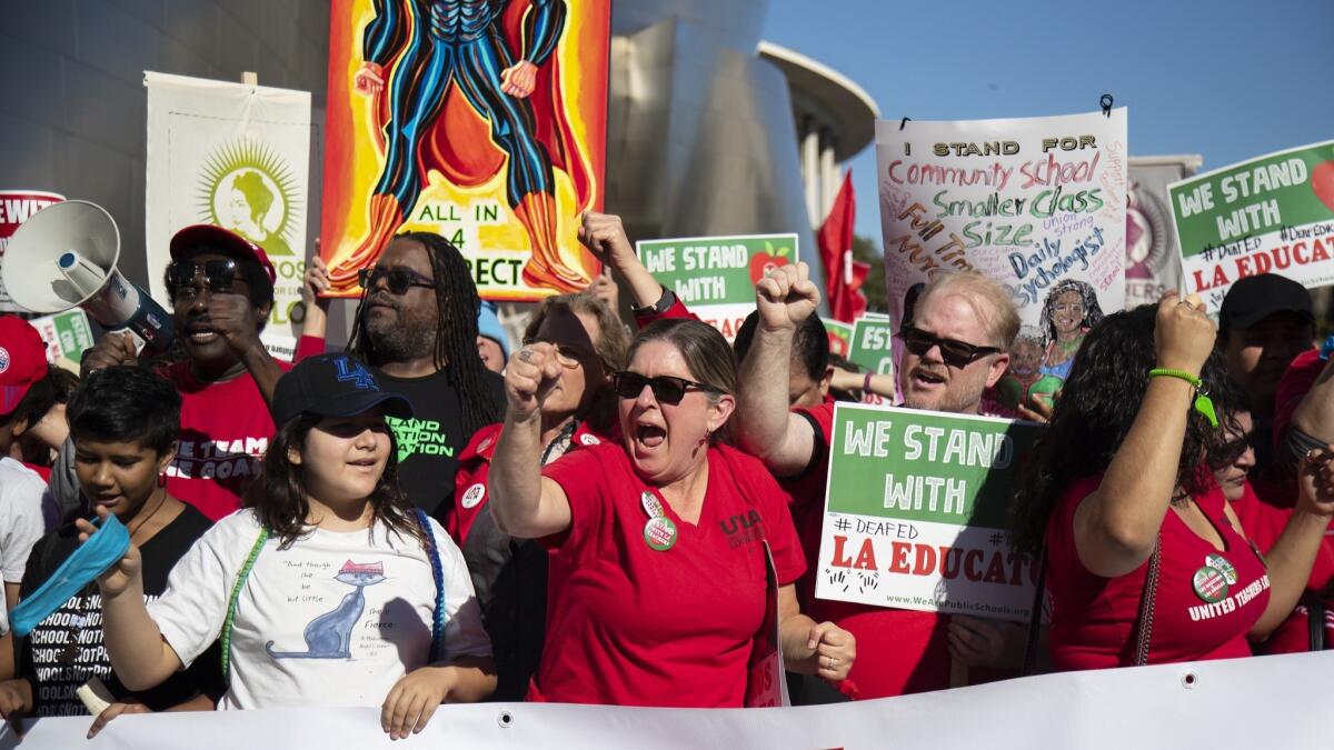 Hundreds of protesters joined in with UTLA to march for Public Education on Grand Avenue near the Broad Museum on Saturday.