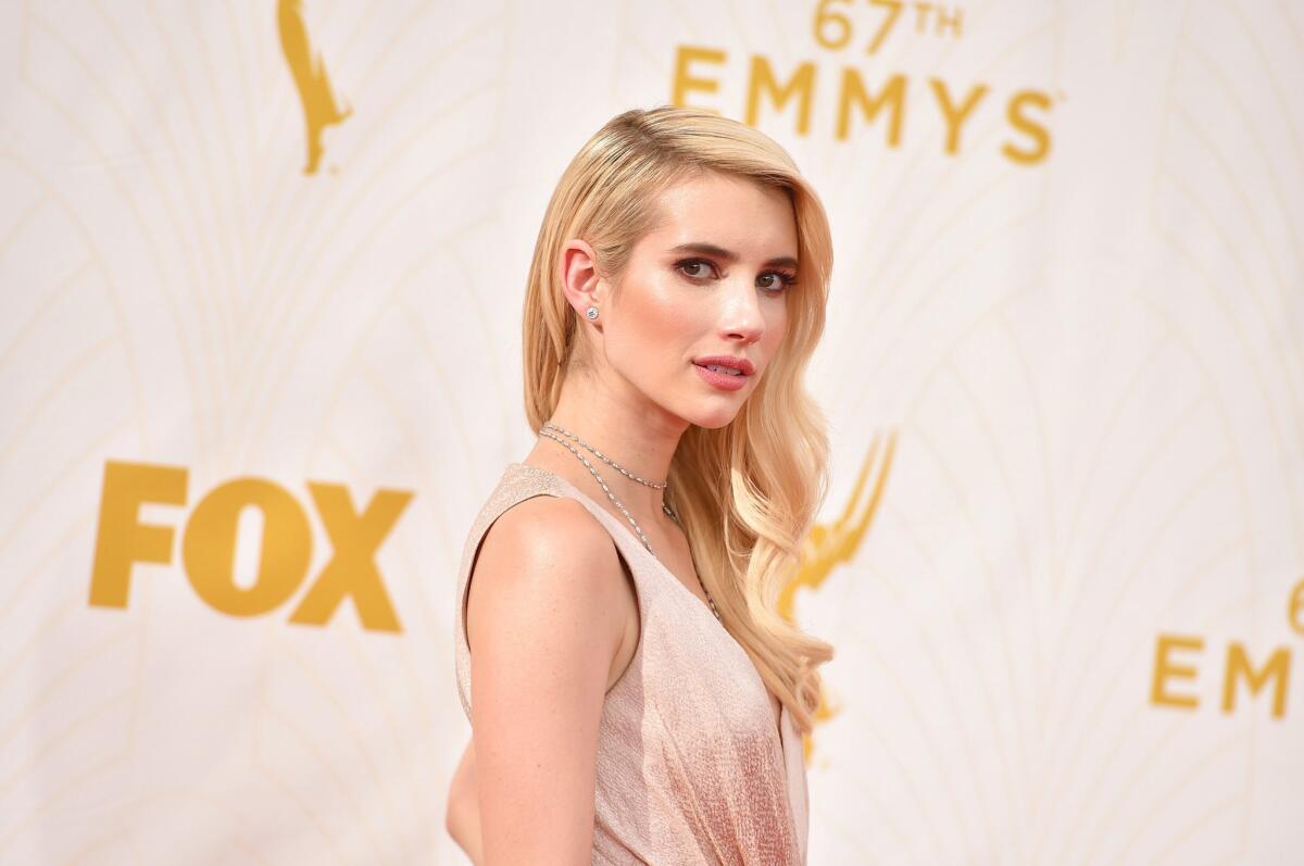 Emma Roberts' hair at the 67th Primetime Emmy Awards channeled Old Hollywood glamour.