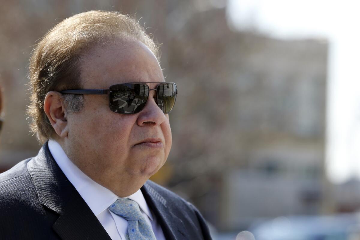 Dr. Salomon Melgen arrives for arraignment at the Martin Luther King Jr. Federal Courthouse in Newark, N.J., on April 2.