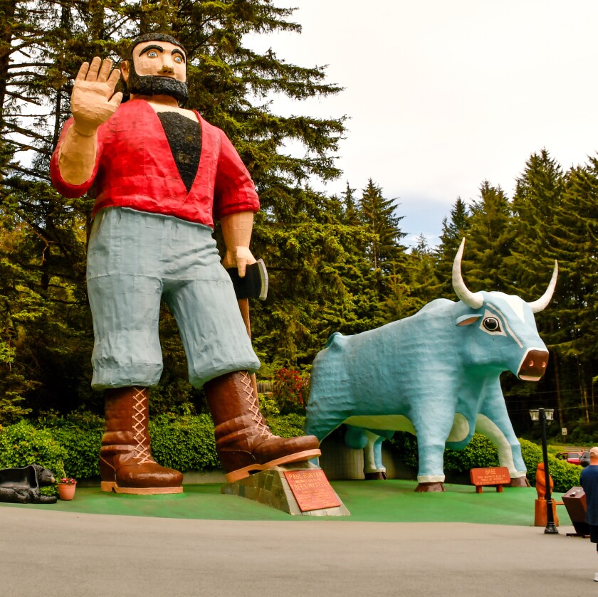 Big wooden statues of Paul Bunyan and Babe the blue ox.