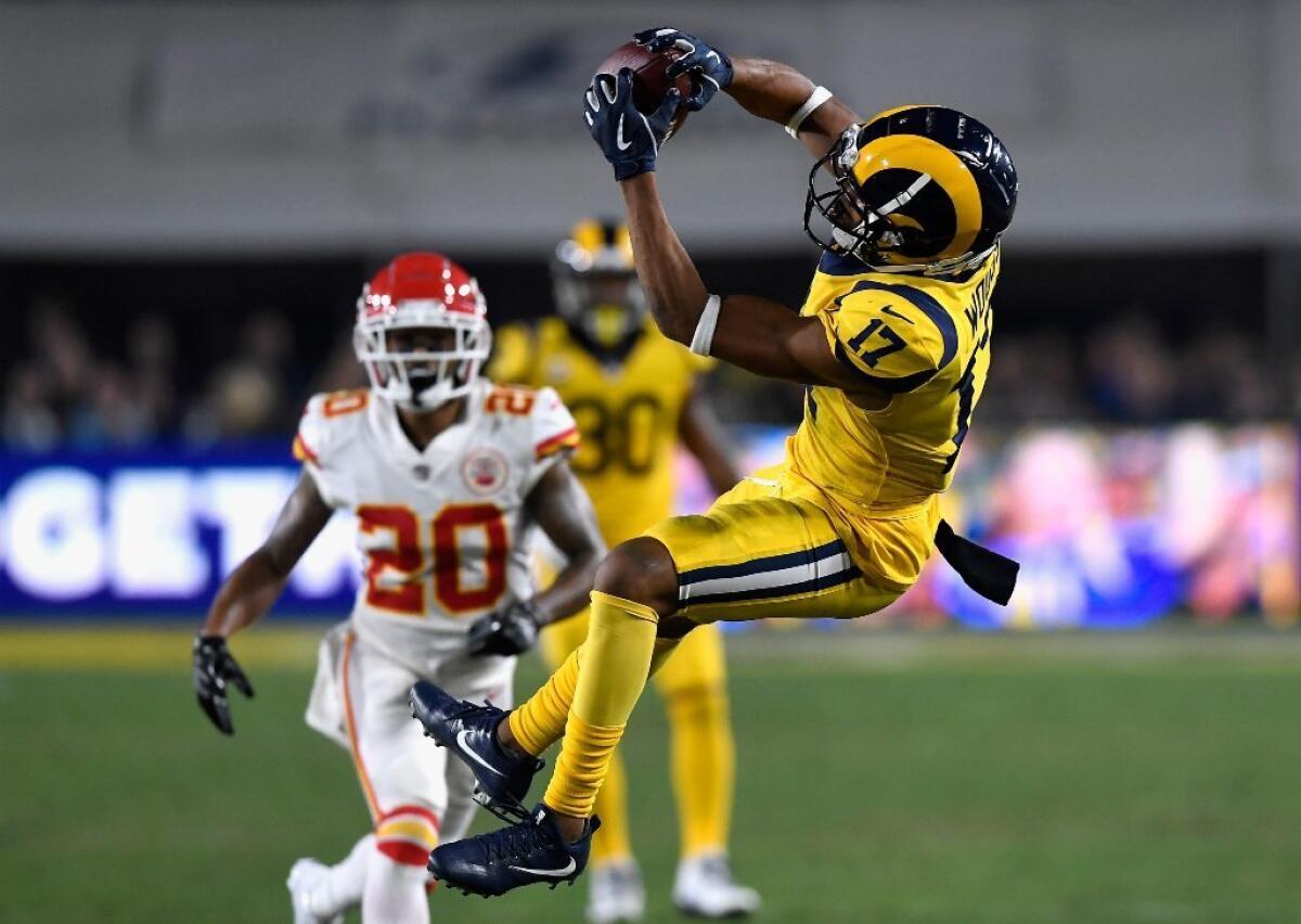 Rams receiver Robert Woods (17) completes a pass to set up the second touchdown against the Kansas City Chiefs on Nov. 19.