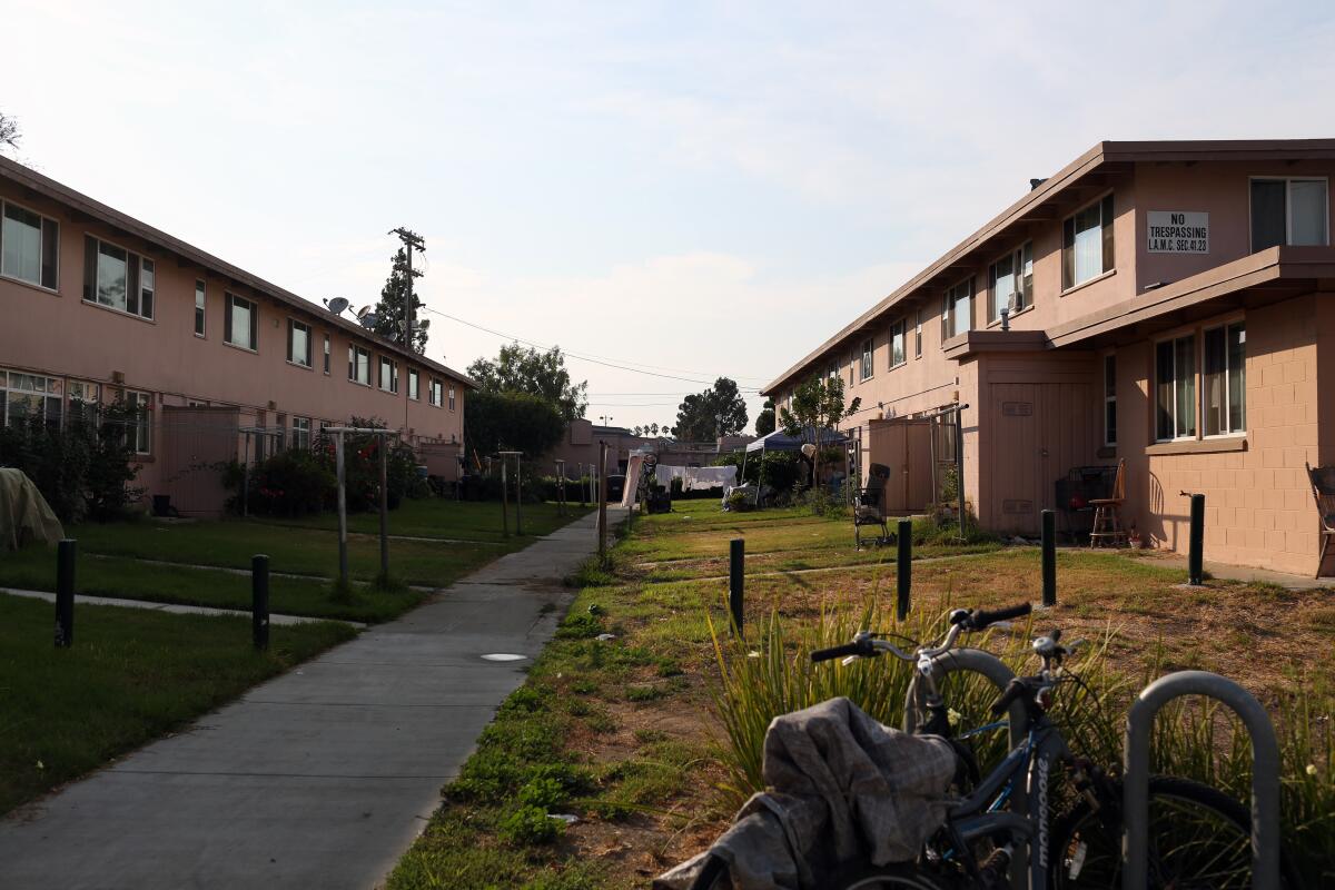 A view of the 1950s barracks-style homes at Mar Vista Gardens, separated by grassy garden areas