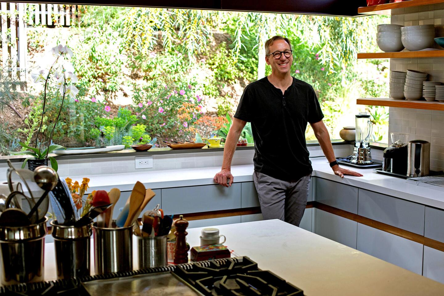 Tim Disney, whose grandfather Roy O. Disney was the brother and business partner of Walt Disney, only recently moved into his 1954 Midcentury Modern home in Silver Lake. But his tailored and contemporary, yet cozy, kitchen has already seen a variety of gatherings — hosting friends, work cohorts and members of his famous family.