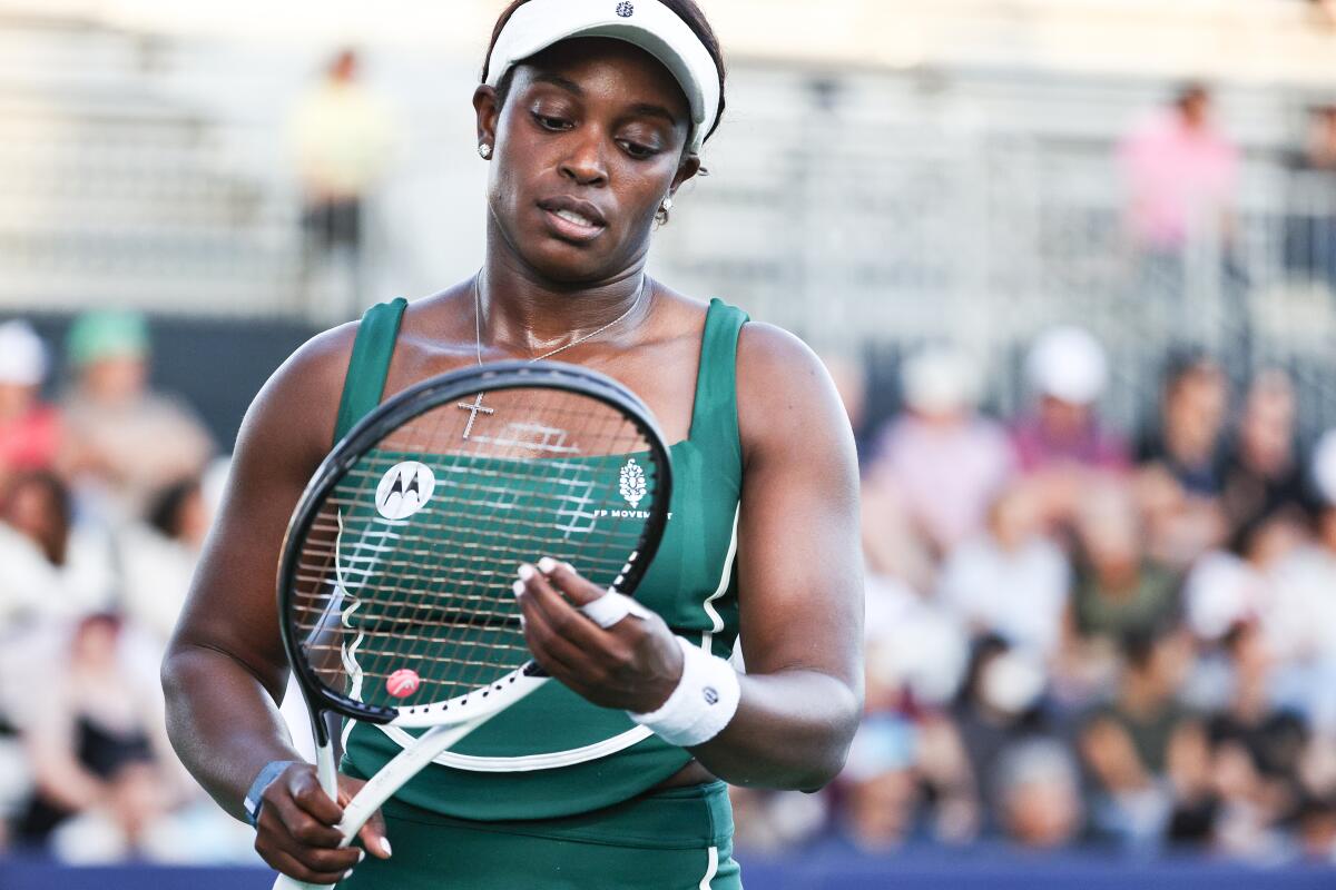 Sloane Stephens reacts during her match against Caroline Garcia during the Cymbiotika San Diego Open.