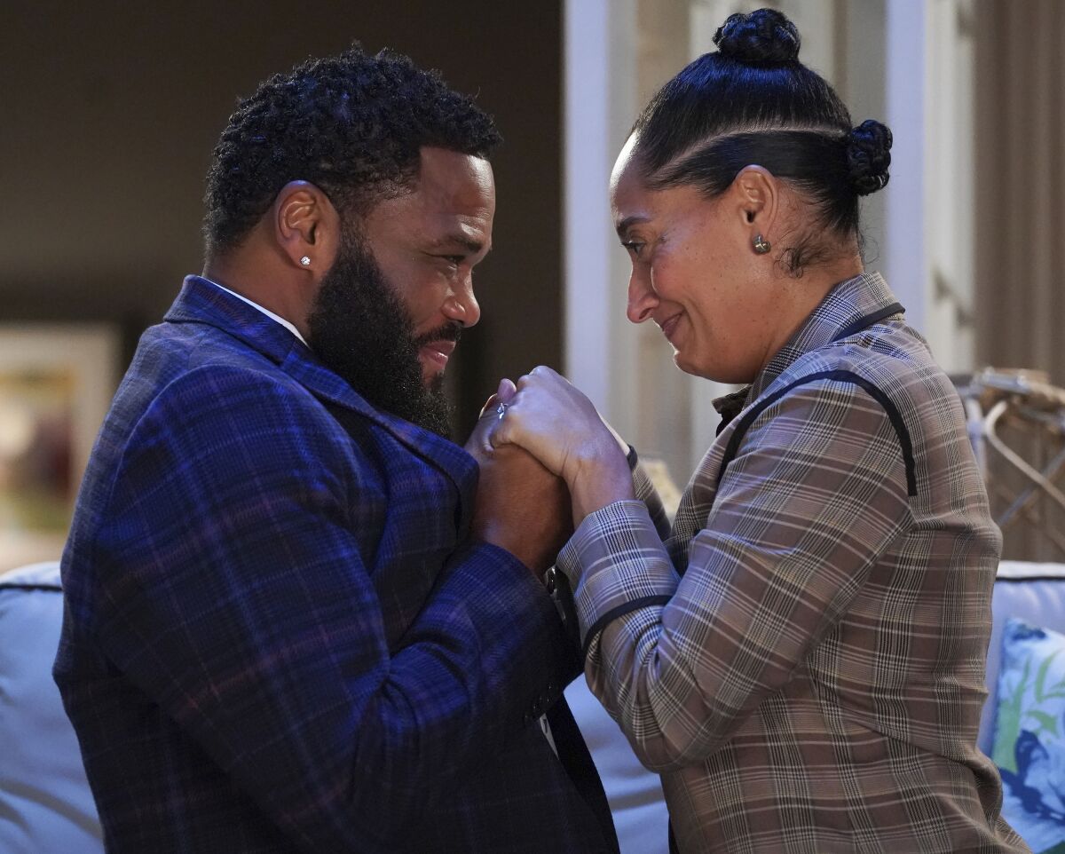 This image released by ABC shows Anthony Anderson, left, and Tracee Ellis Ross in a scene from the series finale of "black-ish," airing April 19. (Richard Cartwright/ABC via AP)
