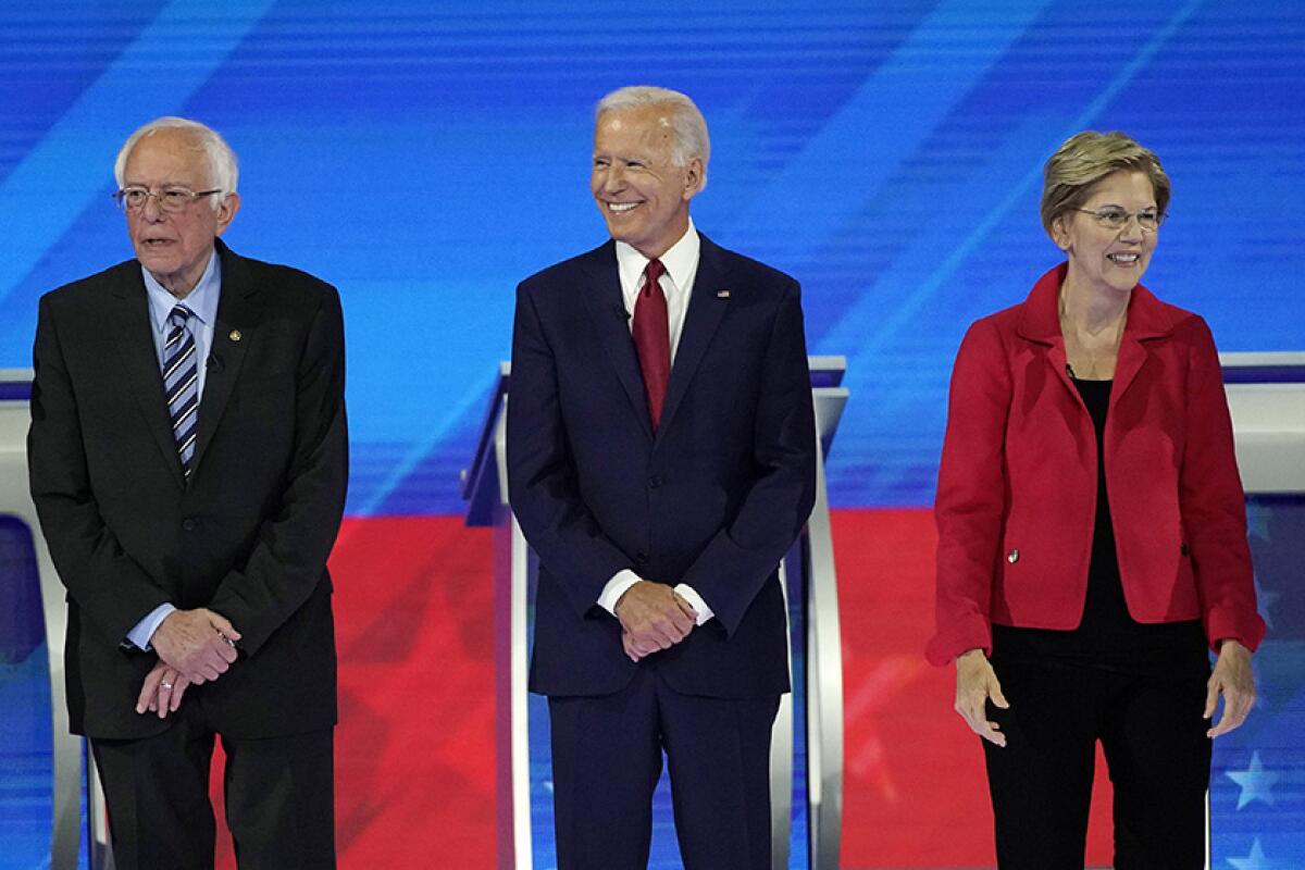 Democratic presidential hopefuls — Bernie Sanders, Joe Biden and Elizabeth Warren — at the candidates' debate in Houston on Sept. 12.