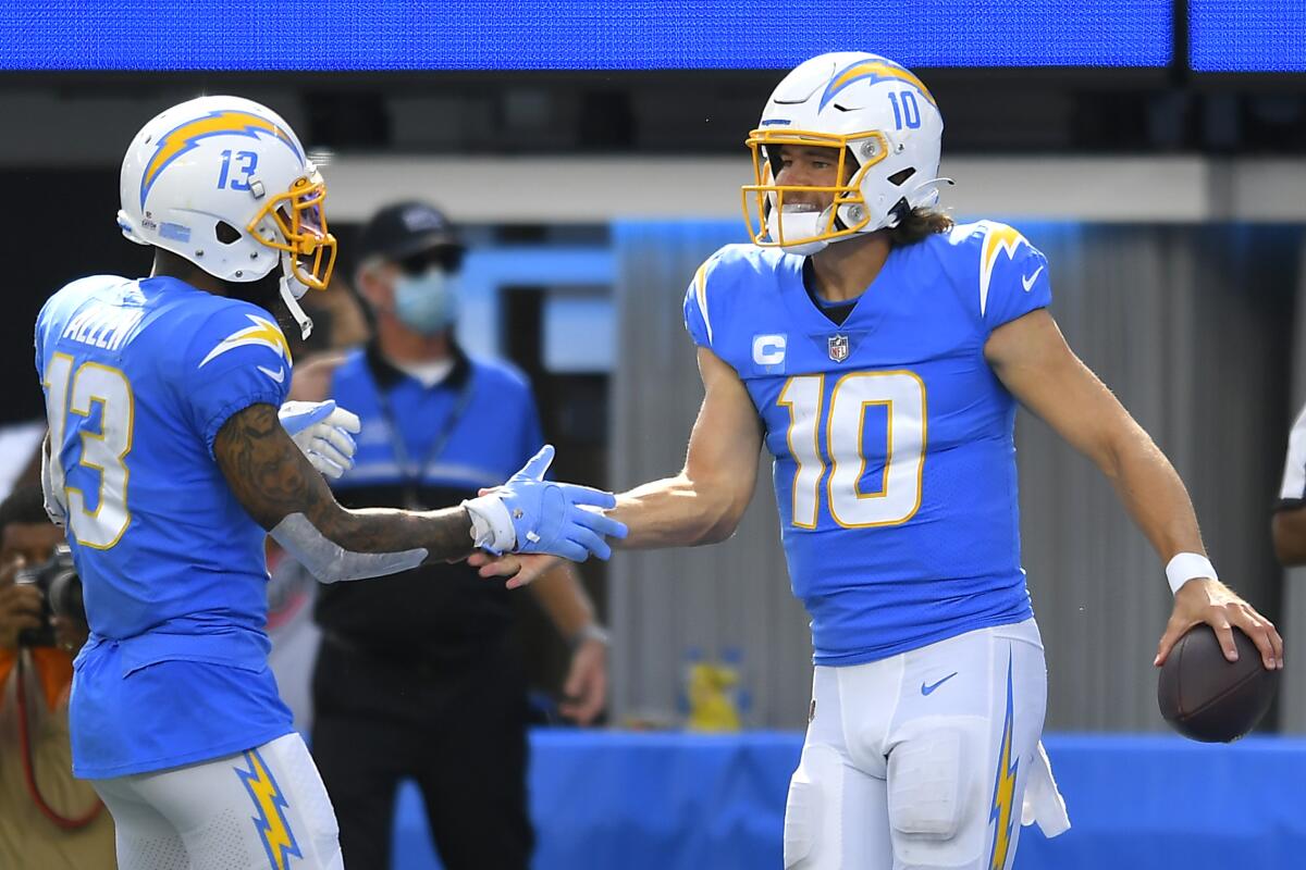 Herbert's 398 yards, Ekeler 3 TDs lead Chargers over Browns